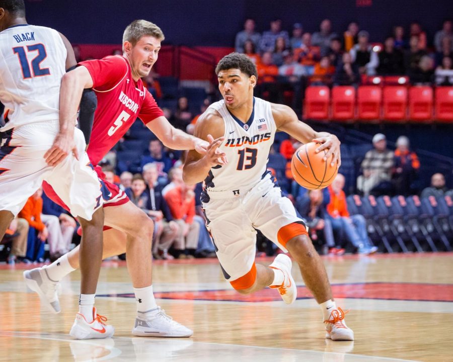 Illinois guard Mark Smith (13) drives to the basket during the game against Wisconsin at the State Farm Center on Thursday, Feb. 8, 2018. The Illini lost 78-69.