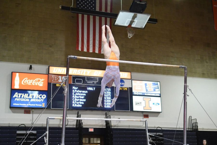 Mary Jane Otto transitions on the bar event on Jan. 19. Illinois beat Maryland 195.075-194.950 at home.