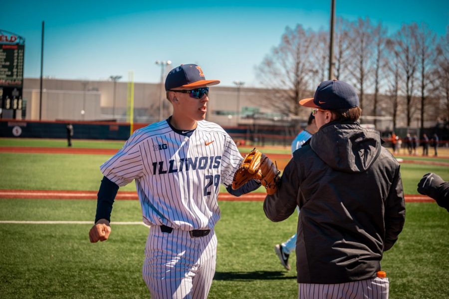 Cam McDonald nudges a teammate at Illinois Field on Saturday. The Illini had a three-game winning streak before losing to the Indiana State Sycamores 1-3 on Tuesday night. 