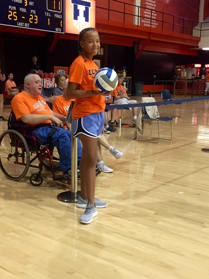 Jordan Corbly, an Illini Ball Kid for women’s volleyball at Huff Hall on August 27, 2016