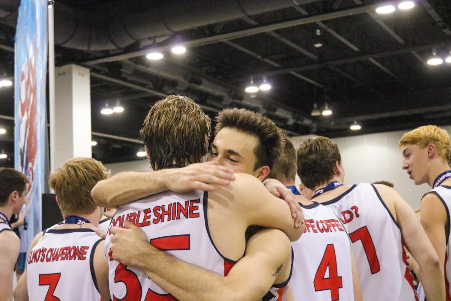 The men’s club volleyball team celebrates its victory at National Championships over the weekend. The Illini were pleased with their second-place finish in the tournament. 