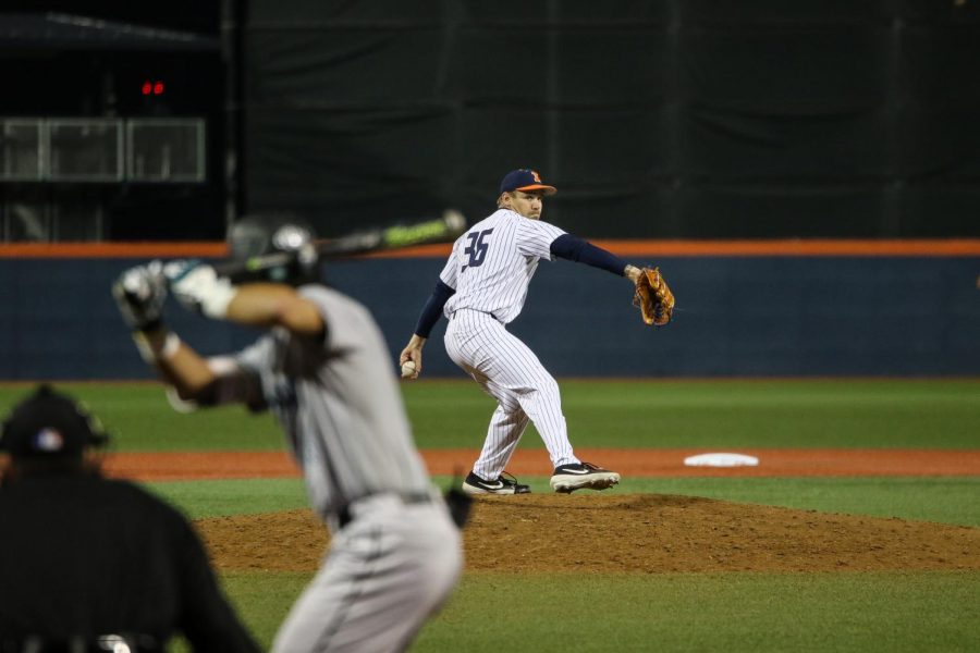 Illini pitcher Josh Harris pitches to a Chanticleer batter in the fifth inning. Harris got the win for Illinois, improving his record to 2-1 this season.
