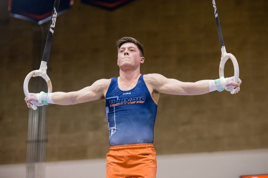 Alex Diab holds steady while competing in the still rings event. Fellow Illini Jordan Kovach was injured on Day One of the Winter Cup Challenge and unable to compete, but, Diab took home the still rings title. 