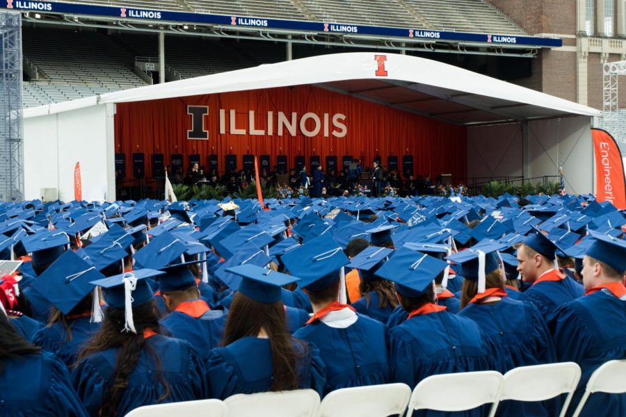 Crowds overlook the commencement stage at Memorial Stadium. The University held a University-wide commencement ceremony on May 11.