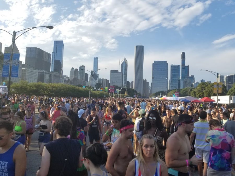 Festival-goers crowd the streets at Lollapalooza on 
Saturday, August 3, 2019, in Chicago.