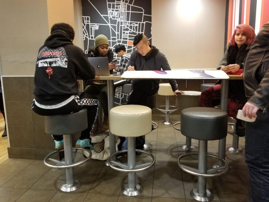 David Wang plays music at a table in the Green Street McDonald’s on November 10. A prominent feature in the late-night atmosphere for the past three years, Wang, recent University graduate, announced the end of his tenure as the McDonald’s DJ this summer.