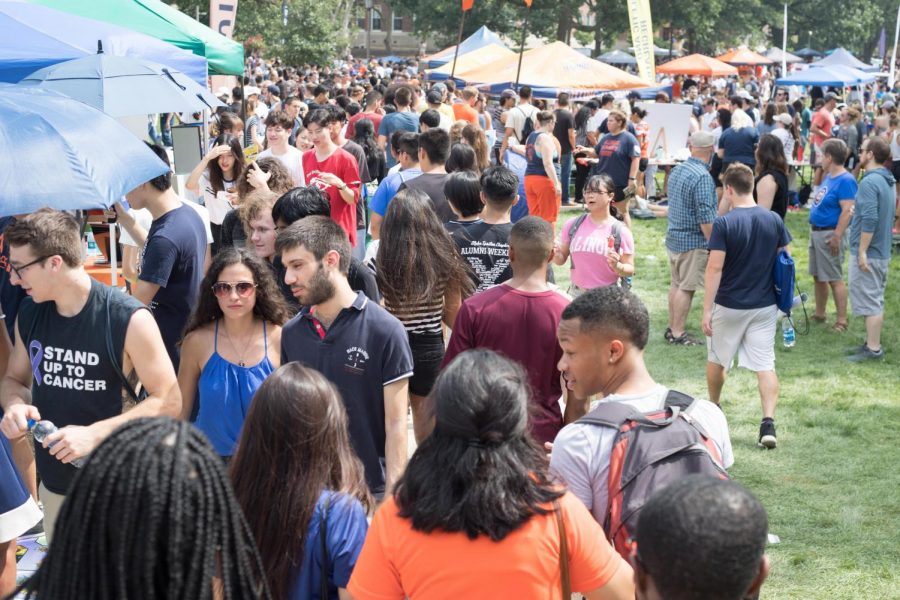 Students walk along the Main Quad during Quad Day on Aug. 26. Quad Day can be both exciting and stressful, but with these hints you can find everything.