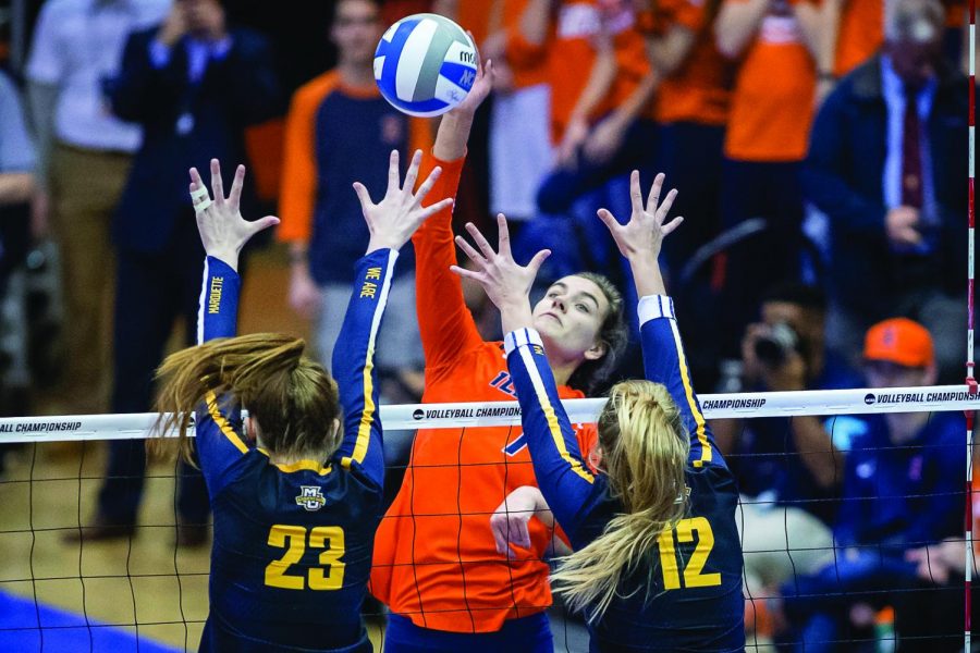 Illinois outside hitter Jacqueline Quade spikes the ball during the match against Marquette in the third round of the NCAA tournament at Huff Hall on Dec. 7. The Illini won 3-0.