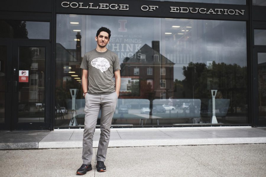 Amir Maghsoodi, a second-year doctoral candidate in the counseling psychology program whose office is located in the College of Education, stands in front of the College of Education Building. The program for doctoral students was recently ranked among the top of the nation.