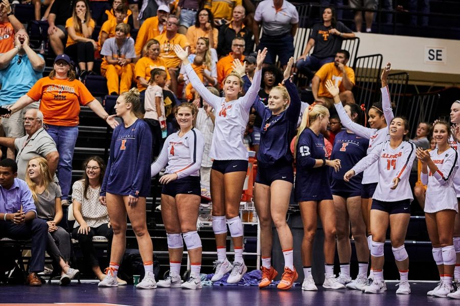 The Illini celebrate after scoring a point at Huff Hall on Sept. 1. Illinois defeated Tennessee 3-2.