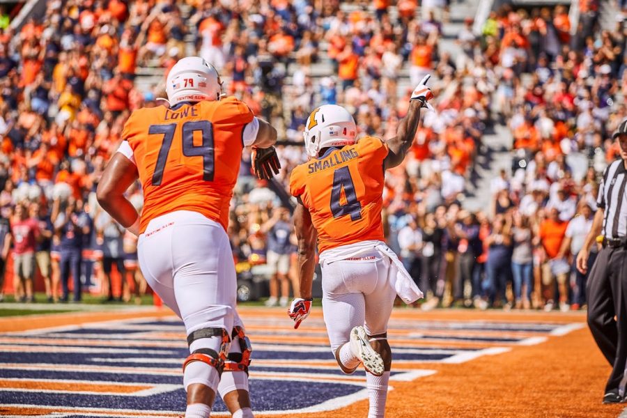 Veteran Lowe (79) and Ricky Smalling (4) run through the end zone on Saturday at Memorial Stadium. The Illini came up short against the Eagles offensively and defensively.