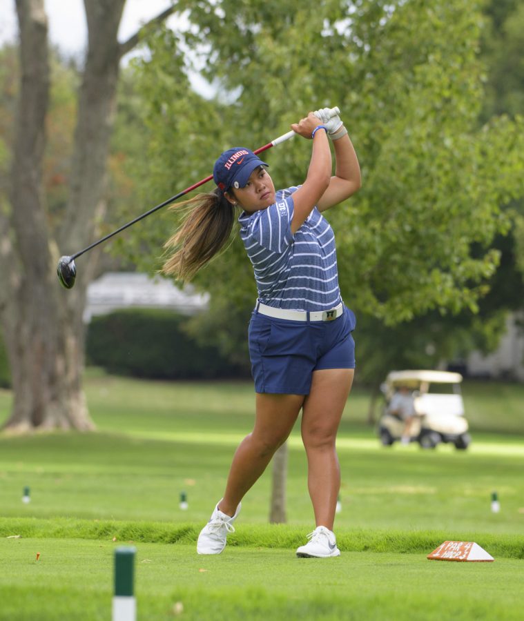 Junior Ali Morallos drives during the Illini’s practice at the Lauritsen/Wohlers Outdoor Golf Practice Facility. The women’s golf team finished fifth as a team at the Glass City Invitational on Tuesday. 