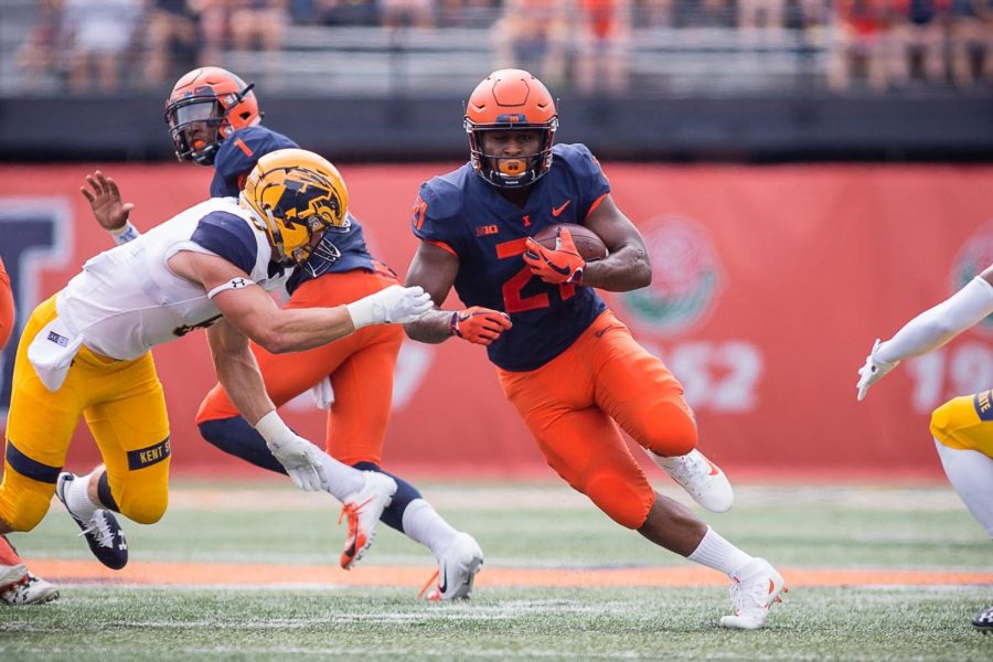 Running back Ra’Von Bonner rushes the ball during the game against Kent State at Memorial Stadium on Sept. 1, 2018. The junior  wants to be known for more than just his role on the field; he wants to make a difference — using his poetry.