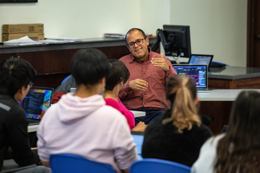 Students gather during a discussion session with Professor Rodriguez. Rodriguez is planning a third service trip to Puerto Rico, this time emphasizing community engagement. 