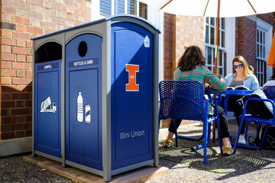 Recycling and trash bins lie near the west courtyard of the Union on Wednesday. The University offers more than 3,000 recycling bins around campus including glass deposits.
