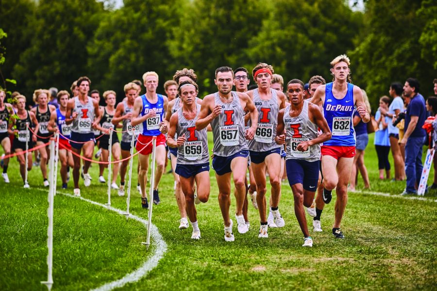 The Illini men’s cross country team leads the pack during the Illini Open at the University Arboretum on Aug. 30. Illinois will head to Peoria, Illinois, to compete in the Bradley Pink Classic on Friday.