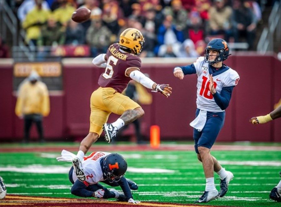Quarterback Brandon Peters (18) throws a pass during their game vs. Minnesota on Saturday. The Illini will play against Michigan, another Big 10 team, on Oct. 12..