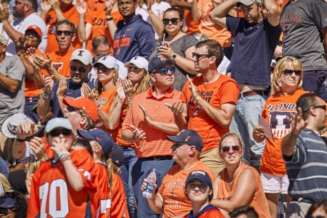 Illinois fans cheer from the stands of Memorial Stadium on Sept. 14 during the Illinois game against Eastern Michigan. Though every student has their own personal perspective of the tradition, Homecoming Week is a celebration that brings the campus together.