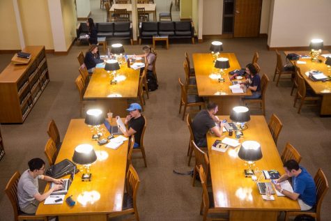 Law students study in the Albert E. Jenner Jr. Memorial Law Library on Wednesday. Despite the festivities this week, students still commit to getting school work done.