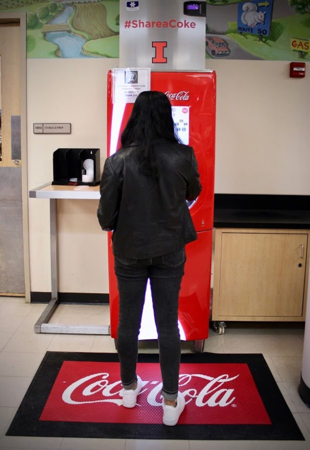 A student uses the Freestyle Coca-Cola machine in 57 North on Friday evening. The Coca-Cola Company was named the world’s leading plastic polluter for the second year in a row and and has been the University’s sole beverage provider since 2010.