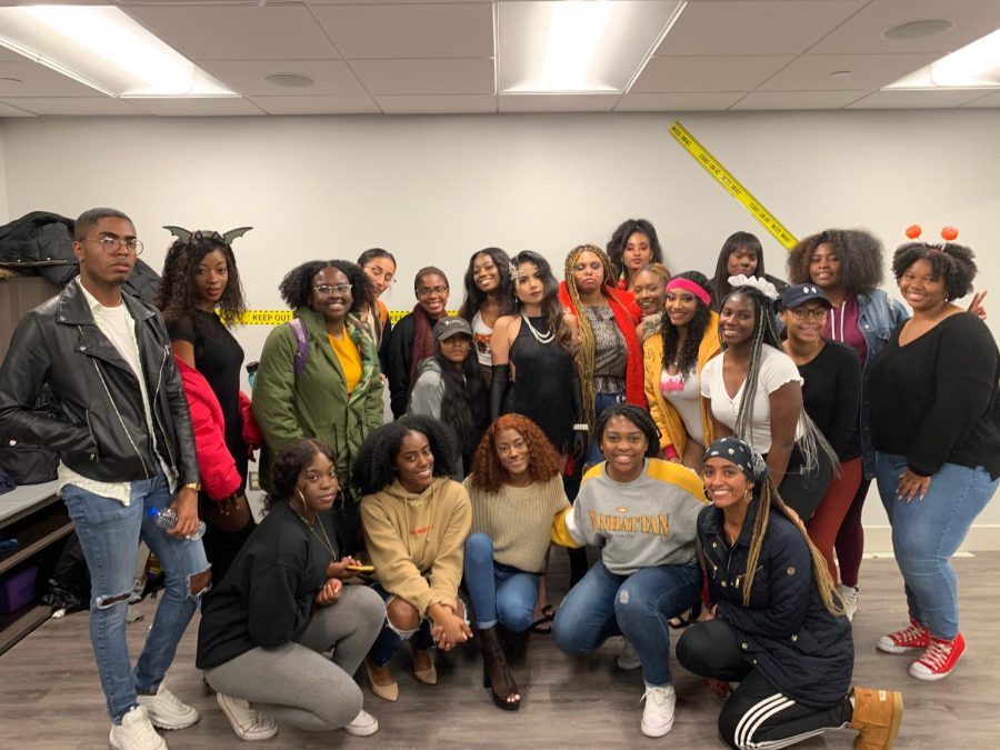 Two student RSOs, The Kat Walk and Living in Color, pose for a photo at the Bruce D. Nesbitt African American Cultural Center on Oct. 30.  The Kat Walk’s debut fashion show will take place in the spring.
