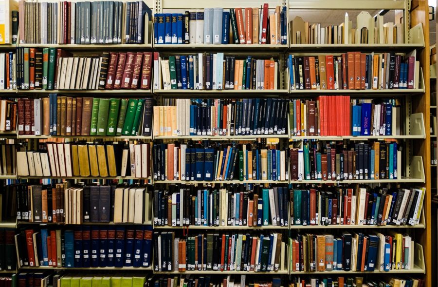 Books sit on the shelves at the Literatures and Languages Library on Tuesday. The University currently holds the title of having the second-largest research library in terms of volume and is home to the second-largest book collection in America, with over 13 million books, manuscripts and papers.
