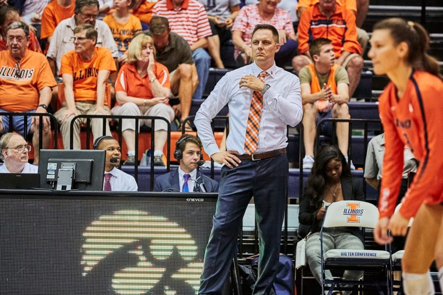 Coach Tamas gazes at the court at Huff Hall on on Sept. 28.
