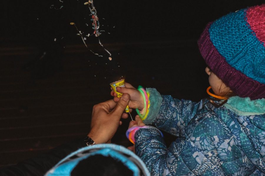 A child uses a party popper at midnight on New Year’s Day 2019. As a college student, there are many options for a New Year’s resolution to make the most of your college experience. 