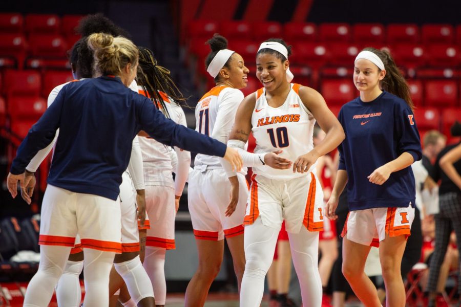 Illinois freshman Jeanae Terry celebrates with teammates during Illinois' game against Ohio State at home on Feb. 6. Thursday night, Terry scored a career-high 15 points against No. 20 Indiana at home. Illinois lost 57-51. 