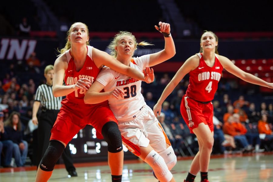 Courtney Joens goes for a rebound during the Illinois game against Ohio State at State Farm Center on Thursday.