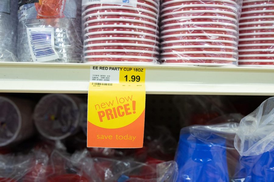 A price tag hangs beneath red plastic cups at County Market on Sunday. A video on Reddit accused the store of charging discounted prices that ended up being more expensive. 