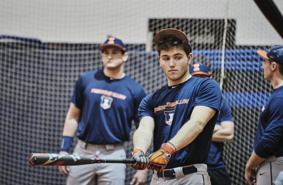 Xavier Watson swings a bat at the Irwin Indoor Football Facility on Wednesday. The Illini have added 18 freshman and transfer players to its roster for the 2020 season.
