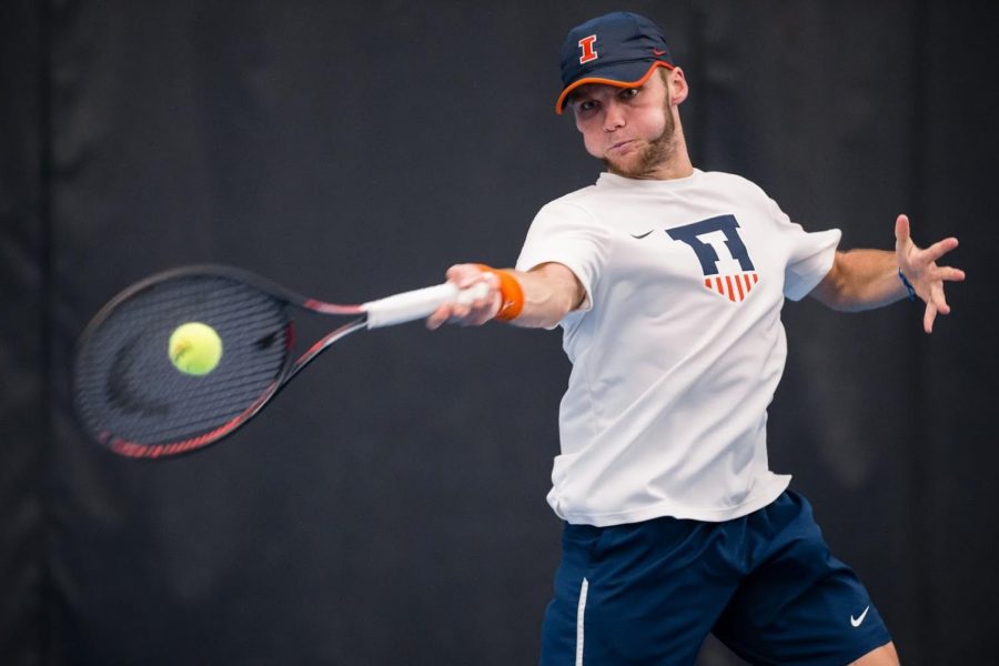 Senior Zeke Clark returns the ball during a match against Penn State at Atkins the Tennis Center on Friday, April 12, 2019. The Illini won 4-3.