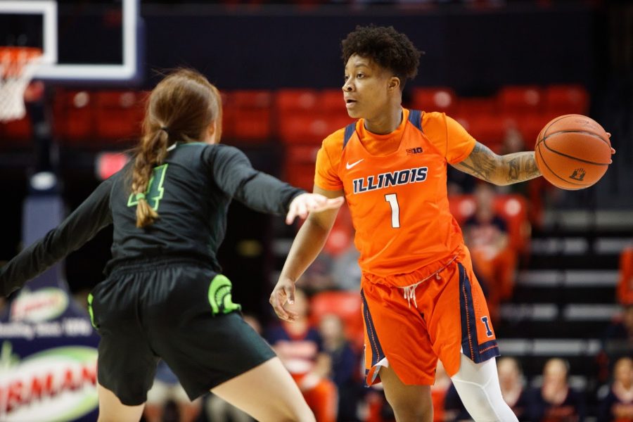 Senior guard Brandi Beasley looks past a defender during the match against Michigan State in the team’s 72-58 loss on Wednesday. The Illini finished the regular season with an 11-18 record.
