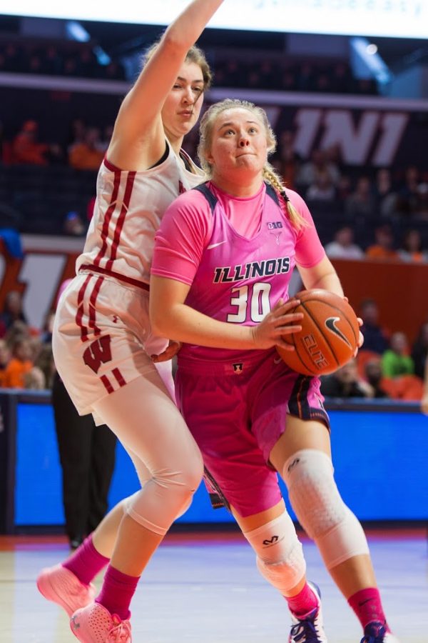 Guard Courtney Joens prepares to jump for a layup during the game against Wisconsin on Sunday. The Illini lost the 73-64.
