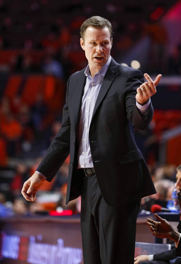 Nebraska head coach Fred Hoiberg directs action on the court from the sidelines during the Illinis game against the Corn Huskers at State Farm Center Monday night. Hoiberg is in his first season at the helm of Nebraskas mens basketball program, following tenures at Iowa State and with the Chicago Bulls. 