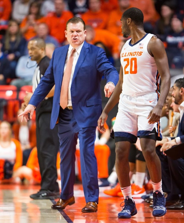Illinois head coach Brad Underwood speaks to junior guard DaMonte Williams as he checks in during the first half at State Farm Center on Thursday. Sunday, the Iowa Hawkeyes snapped  the No. 19-ranked Illinis seven-game winning streak, 72-65 in Iowa City, Iowa. 