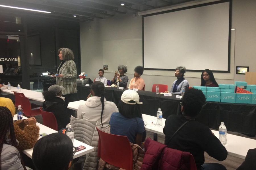 Five hair career professionals sit at the Natural and Professional Meet-up at the Bruce D. Nesbitt African American Cultural Center on Feb 26. The event featured a panel of black women who discussed the beauty and challenges of natural hair in the professional workspace tradition. 
