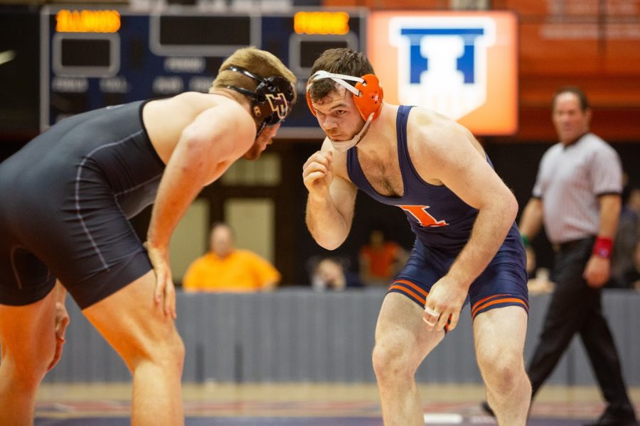 Redshirt freshman Danny Braunagel stares his opponent in the eyes during a meet against Purdue on Feb. 16.  Braunagel qualified for the NCAA Championship this year along with six of his teammates.