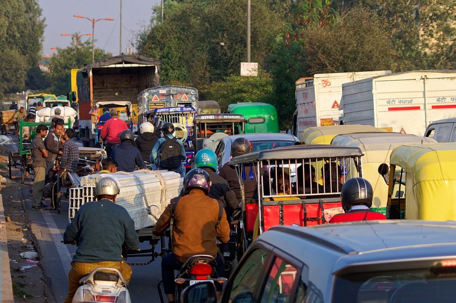 A New Delhi street is filled with early afternoon traffic on Dec. 3, 2019. Some international students forced to move back home to places like India are struggling with the time zone difference.