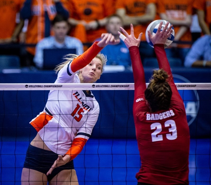 Senior Megan Cooney spikes the ball during the match against Wisconsin on Dec. 18, 2018. The Illini won the match 3-1 and advanced to the Final Four of the NCAA