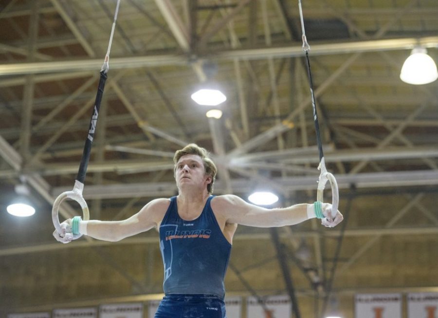 Senior Danny Graham competes in the rings event during the match against Oklahoma on March 17, 2018