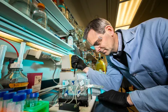 Martin Burke works in the Roger Adams Laboratory in Urbana, IL. Burke is the co-author of the new treatment being developed to treat all types of cystic fibrosis. 