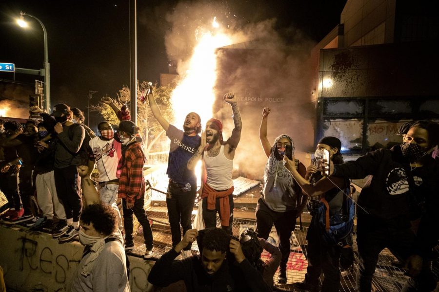 The Minneapolis Third Police Precinct is set on fire during a third night of protests following the death of George Floyd while in Minneapolis police custody, on Thursday, May 28, 2020