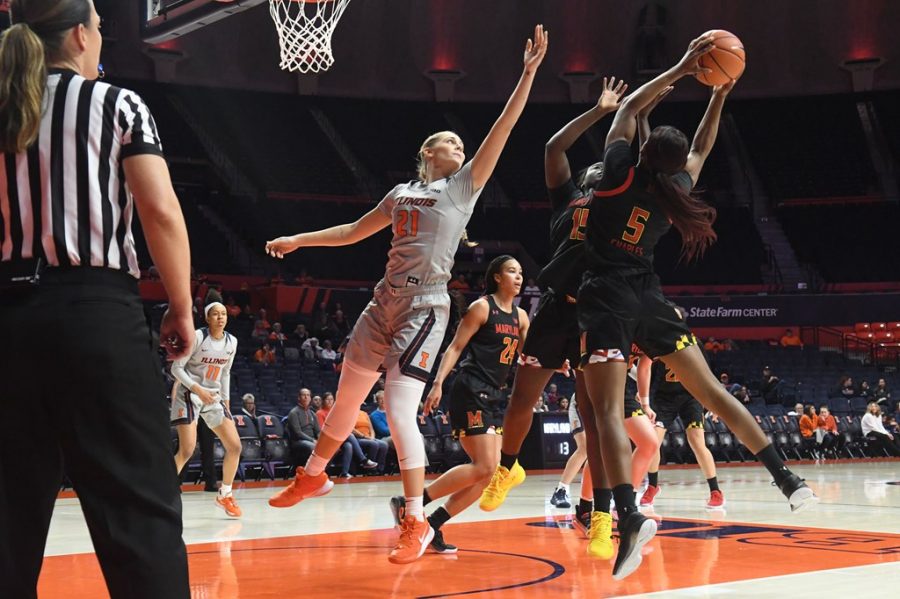 Nancy Panagiotopoulou Andritsopoulou of the Illinois Womens Basketball team leaps to block a Maryland player at State Farm Center on Jan. 23, 2020.