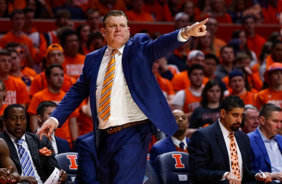 Illinois Head Coach Brad Underwood points towards the court during the match against Nebraska at State Farm Center in Champaign, Illinois on Monday, Feb. 24.