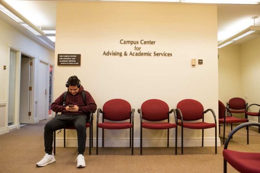 Adrian Martinez, a freshman in DGS, waits to meet with his advisor on March 5, 2019 in the Campus Center for Advising & Academic Services on Wright St.