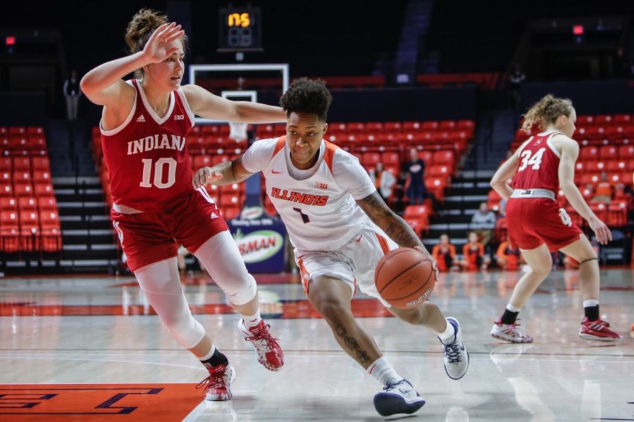 Senior Brandi Beasley drives past a defender during the match against Indiana on Feb. 13 at State Farm Center.
