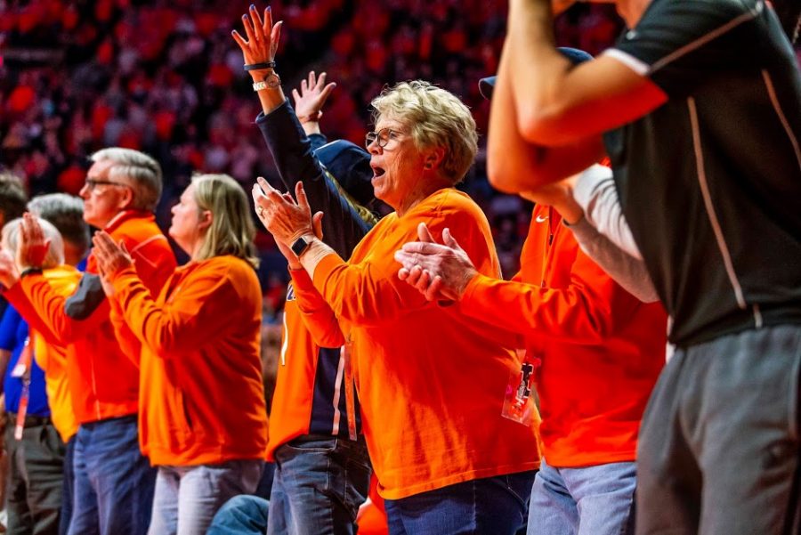 Illini fans cheer from the sidelines at the game against Iowa on March 8. Fans have high expectations for the upcoming season.