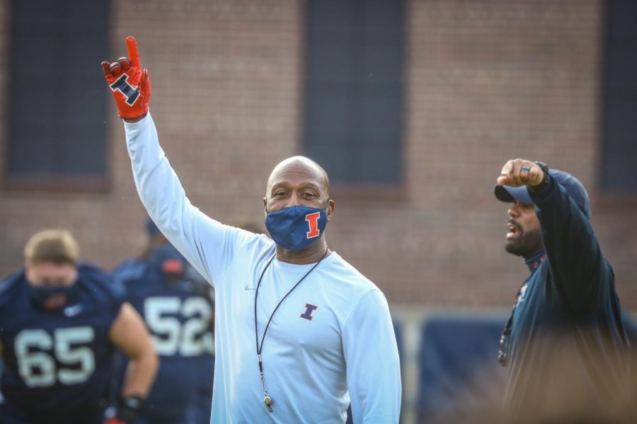 Illini football head coach Lovie Smith waves at the teams first practice since the BIg Tens decision to reinstate the fall football seaosn. The Illini have roughly four weeks to practice before the season begins. 